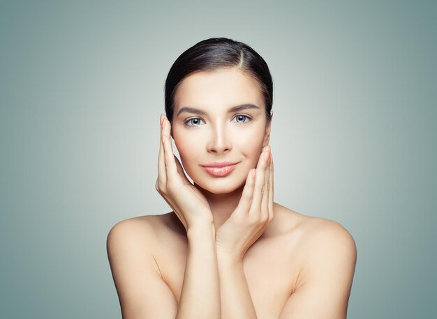 young-healthy-woman-with-clear-skin-facial-treatment-healthcare-concept_263368-7675