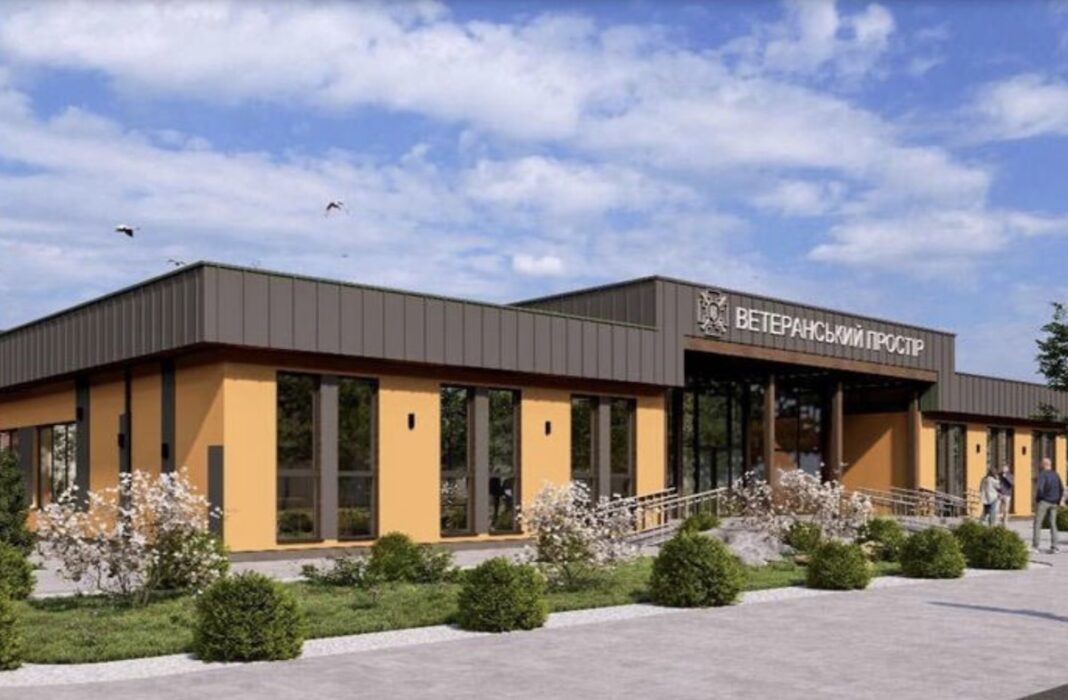 Візуалізація одноповерхової будівлі жовто-сірого кольору з вивіскою 