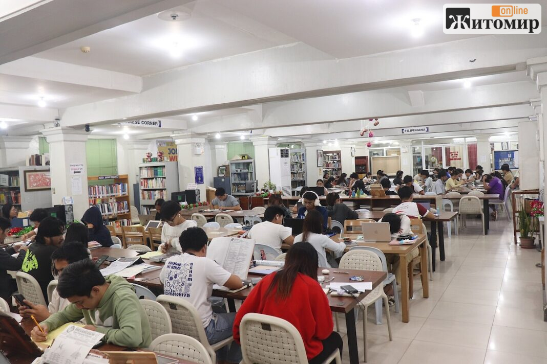 Students_and_Readers_in_the_Library Students_and_Readers_in_the_Library